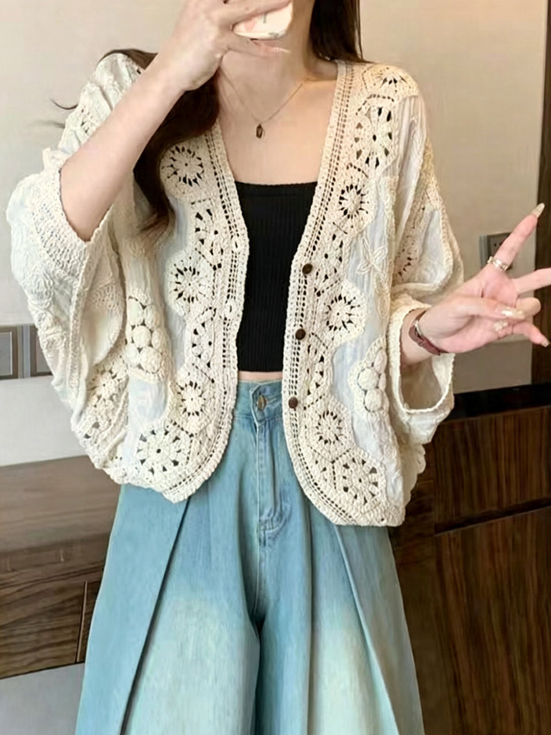Bohemian-style V-neck cardigan with three-quarter sleeves
