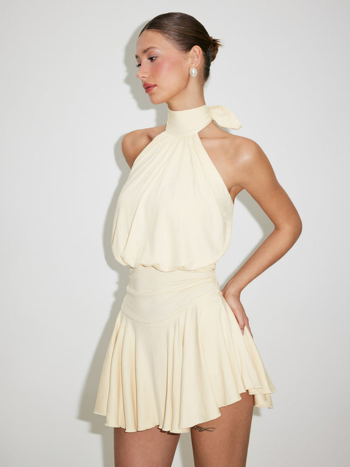 Backless halter-neck dress with a fitted waist