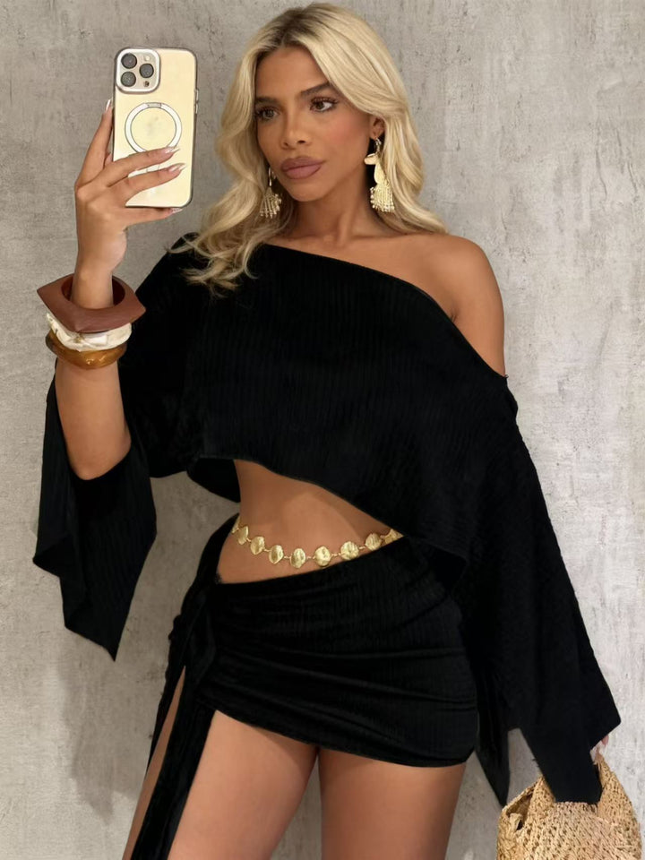 One-shoulder top and hip-hugging mini skirt set