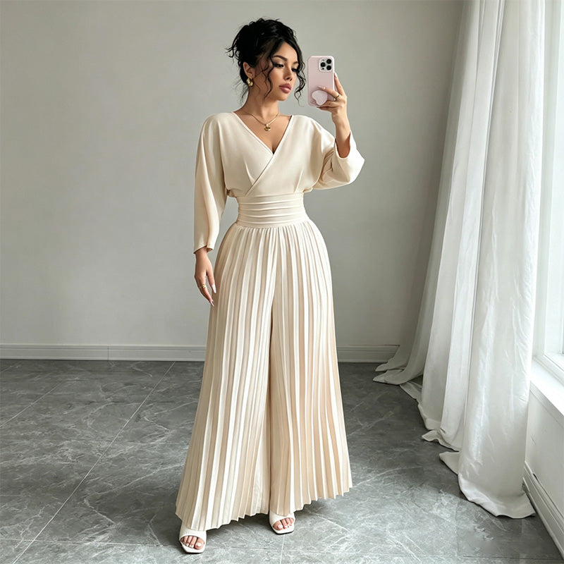 Solid color V-neck fitted waist pleated jumpsuit
