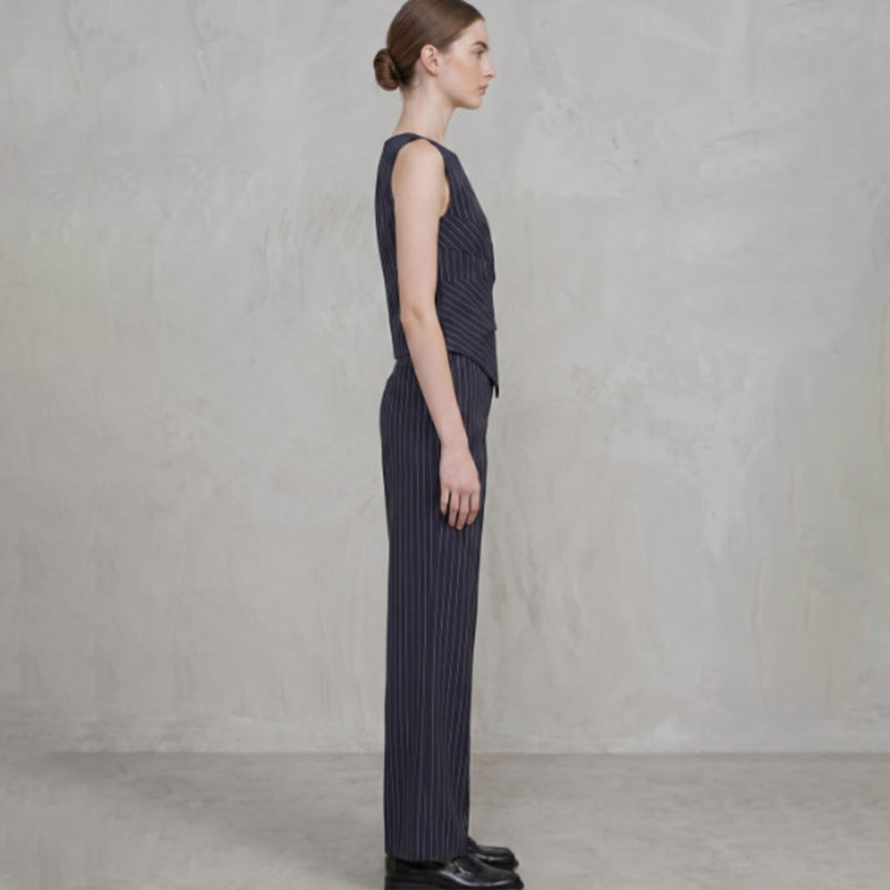 Striped sleeveless asymmetric top and straight-leg trousers set