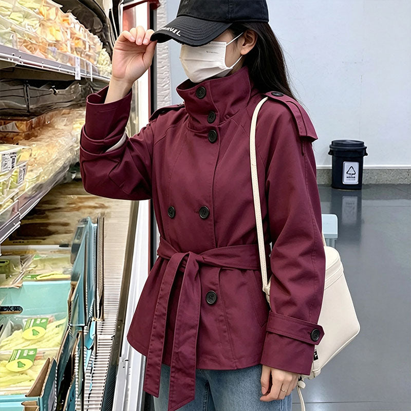 Cropped trench coat with a belted waist