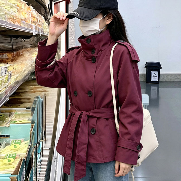 Cropped trench coat with a belted waist
