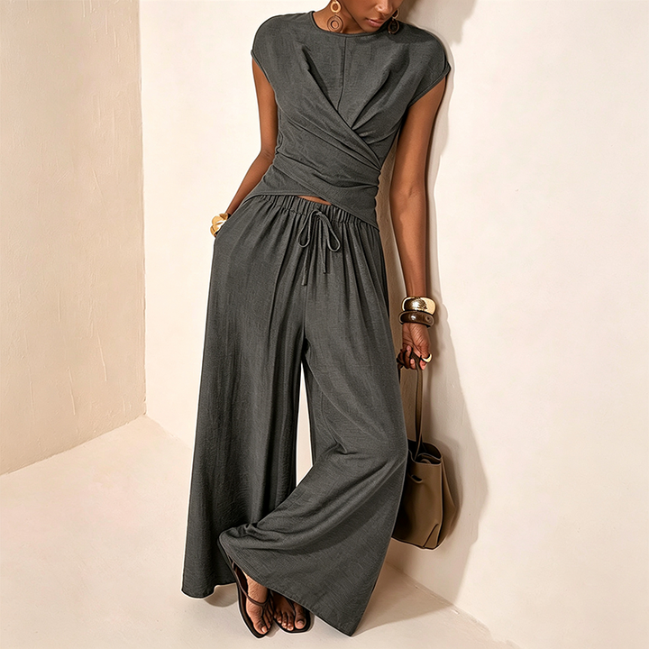 Asymmetrical top and high-waisted wide-leg trousers set