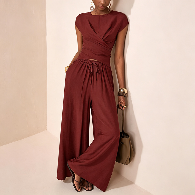 Asymmetrical top and high-waisted wide-leg trousers set
