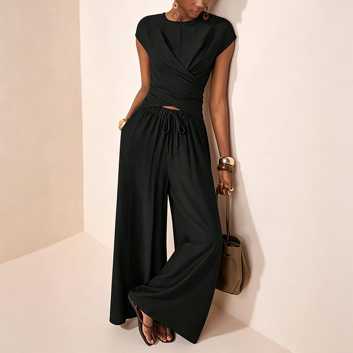 Asymmetrical top and high-waisted wide-leg trousers set