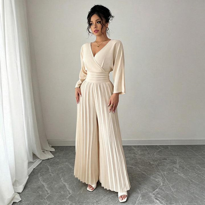 Solid color V-neck fitted waist pleated jumpsuit