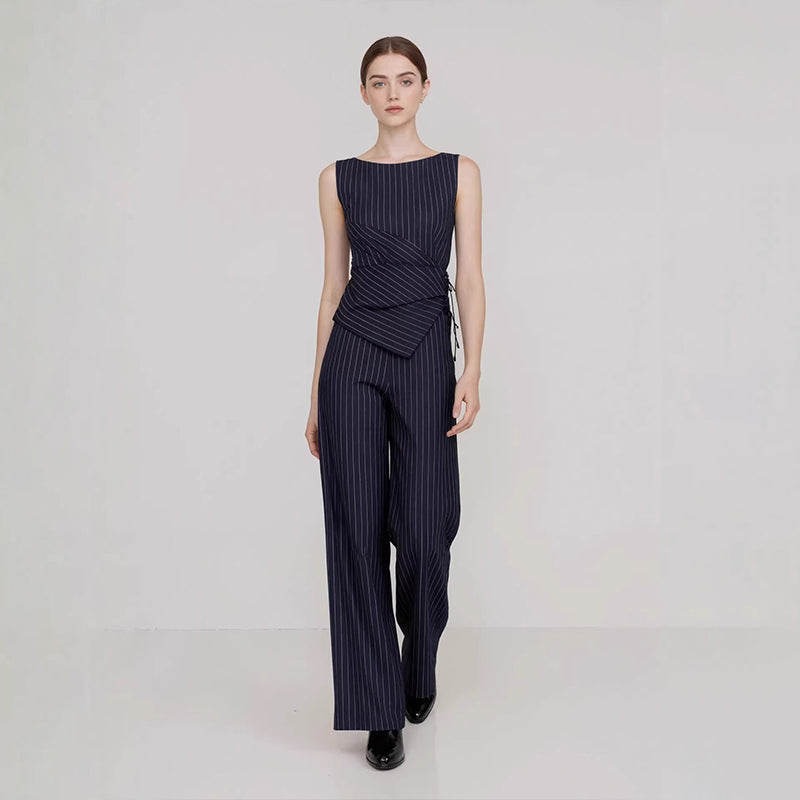 Striped sleeveless asymmetric top and straight-leg trousers set
