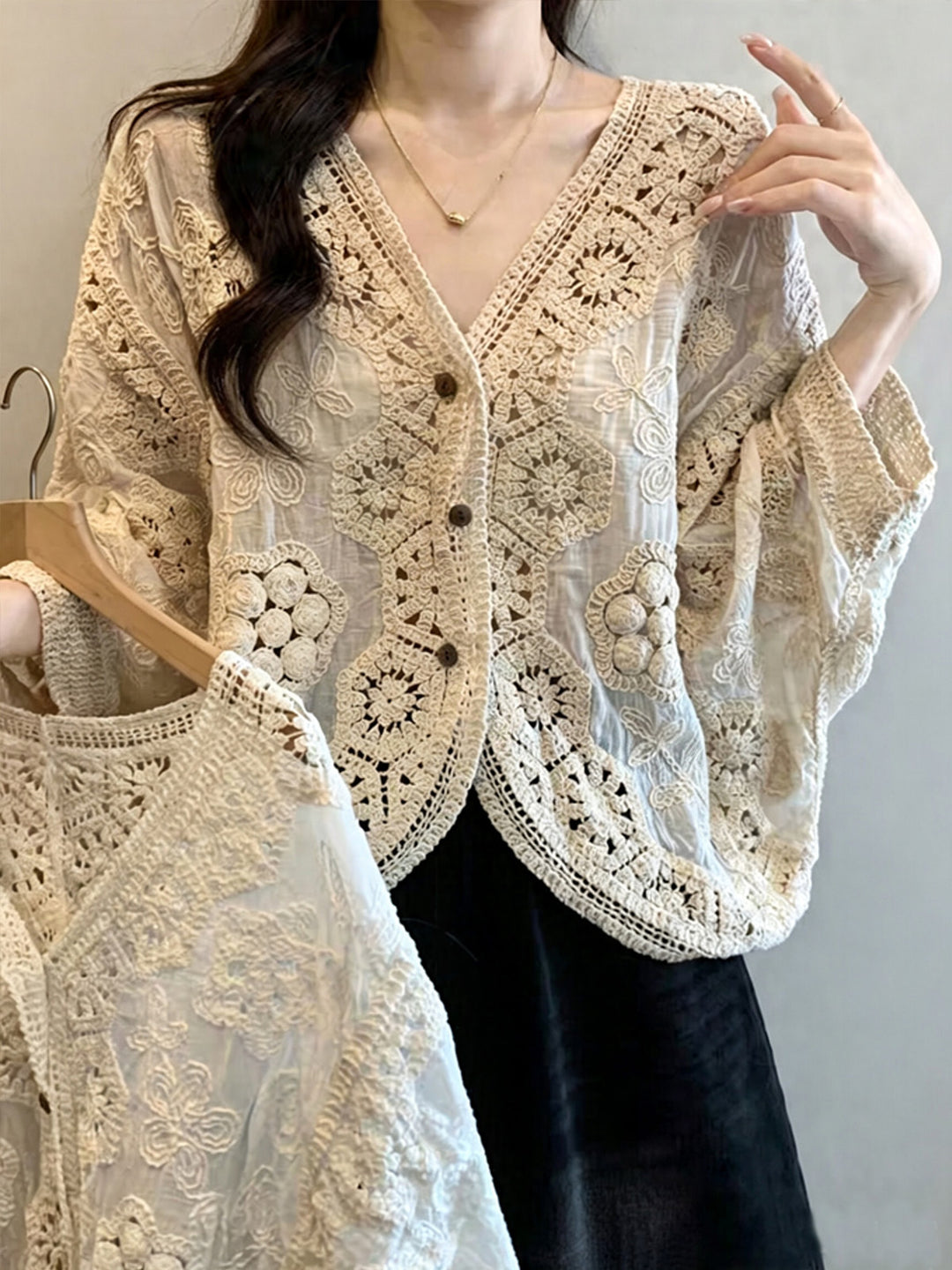 Bohemian-style V-neck cardigan with three-quarter sleeves