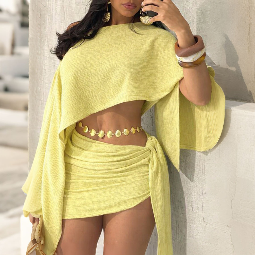 One-shoulder top and hip-hugging mini skirt set