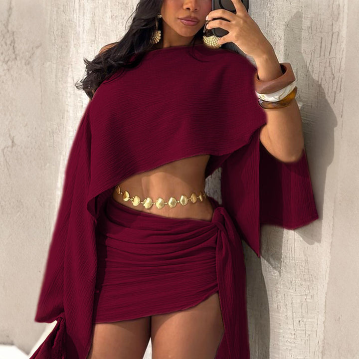 One-shoulder top and hip-hugging mini skirt set