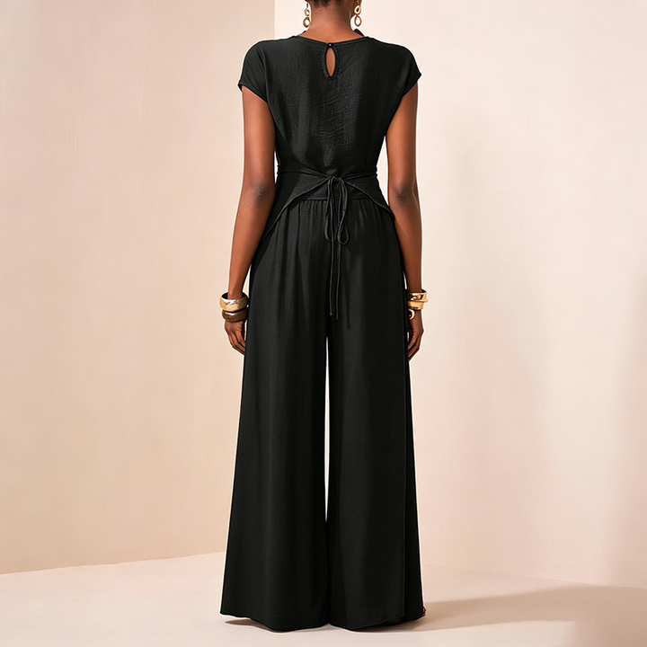 Asymmetrical top and high-waisted wide-leg trousers set