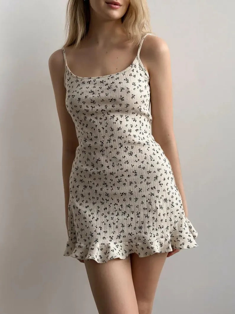 Ditsy Floral Ribbed Mini Dress.Sweet fit. Effortless charm.