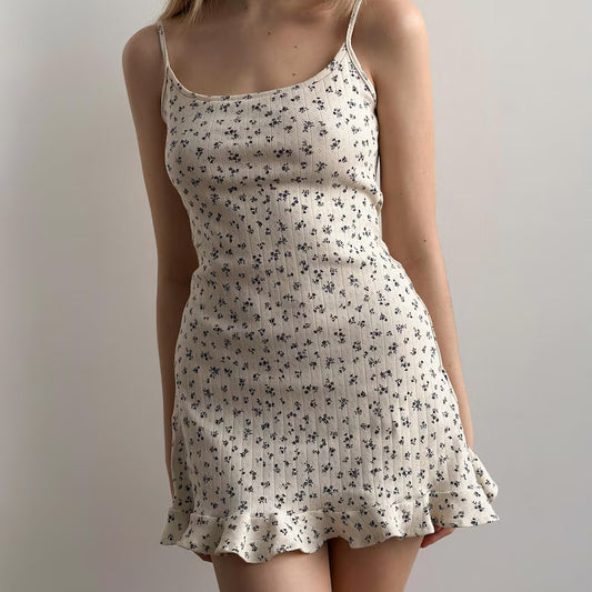 Ditsy Floral Ribbed Mini Dress.Sweet fit. Effortless charm.