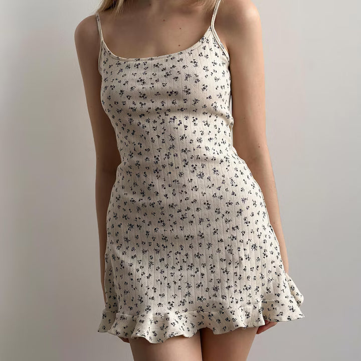 Ditsy Floral Ribbed Mini Dress.Sweet fit. Effortless charm.